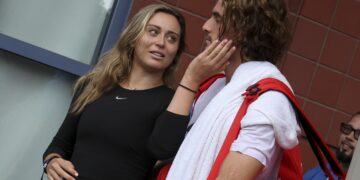 Pictured: Around team and family, Stefanos Tsitsipas and his girlfriend Paula Badosa are beaming as they enjoy an Italian dinner date.